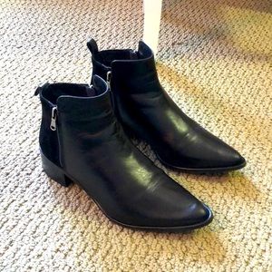 Italian made booties leather, zippers on left and right make easy to get on.